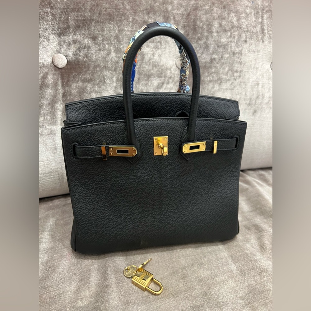 Hermes Black Satchel with Gold Accents